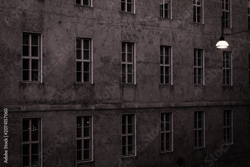 Grey wall with bright single light