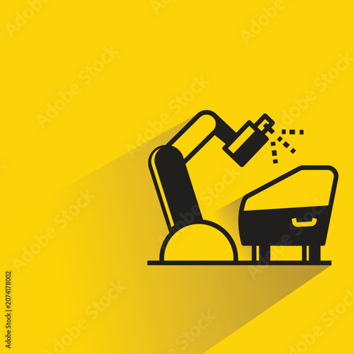 robotic arm in spray work icon with drop shadow yellow background