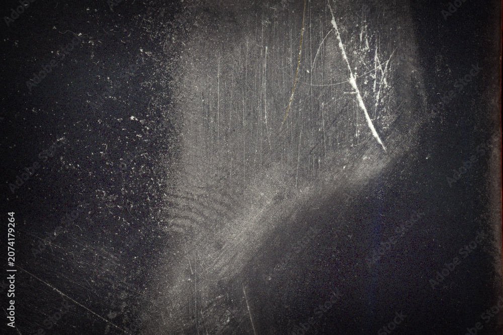 Naklejka premium Blank grained film strip texture background with heavy grain, dust and light leak
