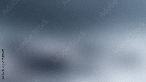 Abstract blurred gradient background featuring smooth transition from dark blue to light grey tones.