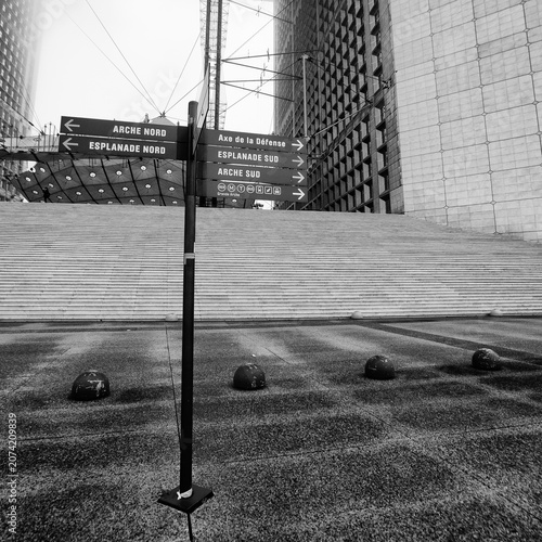 Directional signs and monumental stairs at La Défense business district