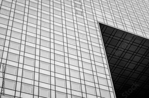 Geometric glass facade of a contemporary office building