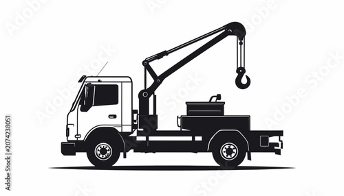 Tow truck with crane arm extended.