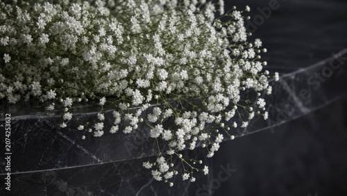 White Baby Breath Flowers on Black Marble