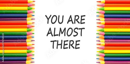 You are almost there words symbol. Concept words You are almost there on beautiful white paper. Beautiful white background. Business You are almost there motivational support concept. Copy space.