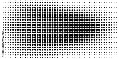 Abstract black and white halftone dots gradient background.