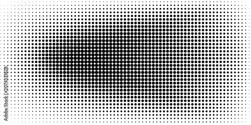 Abstract black and white halftone dots gradient background.