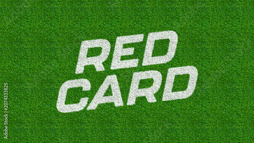 Fotografija White lettering for red card is chalked onto bright green turf.