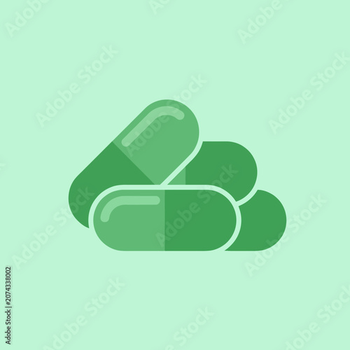A pile of green medical capsule pills in a flat icon style