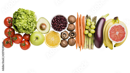 Obraz na plátne Assorted fresh fruits and vegetables arranged in a line