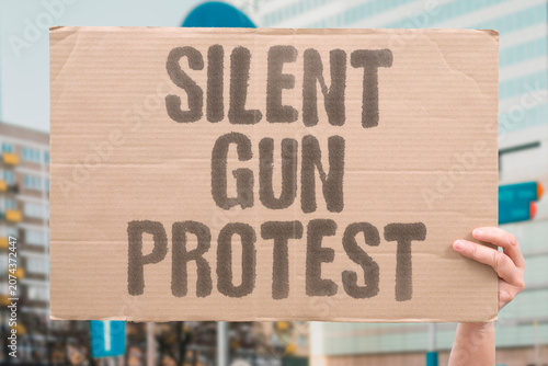 Canvas-taulu "Silent gun protest" Noiseless weapon used on demonstrators