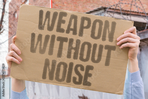 Slika na platnu "Weapon without noise" Silent force causes physical distress