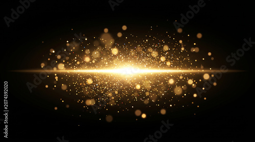 Cuadro en lienzo golden light particles explosion with glowing bokeh effect on black background