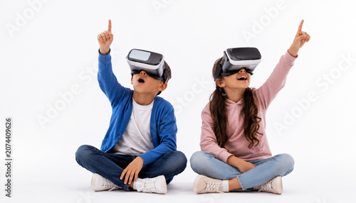 Virtual reality children using VR headsets for immersive learning and gaming technology on white background