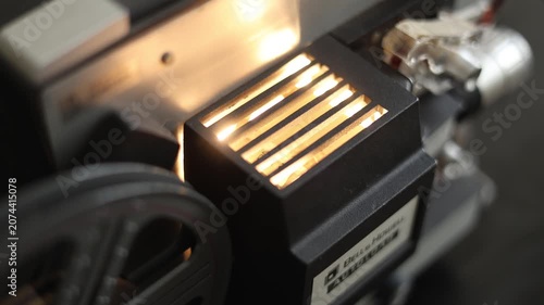 Looking Down On Vintage Super 8MM Film Projector Operating.