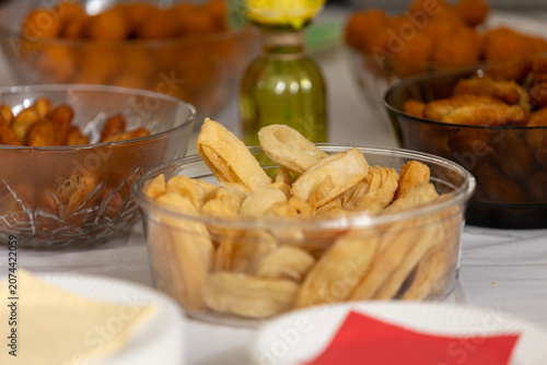 Assortment of fried snacks in bowls, ready for a party or gathering