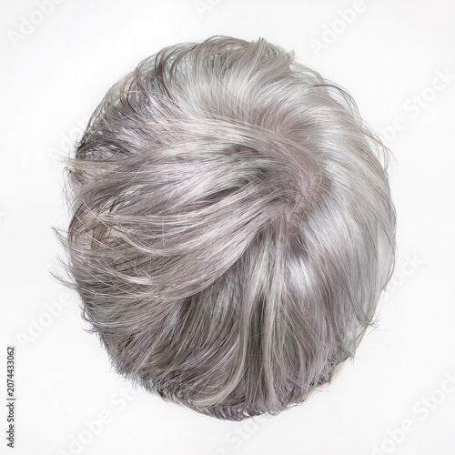 Elegant gray hairstyle showcasing soft waves and stylish volume