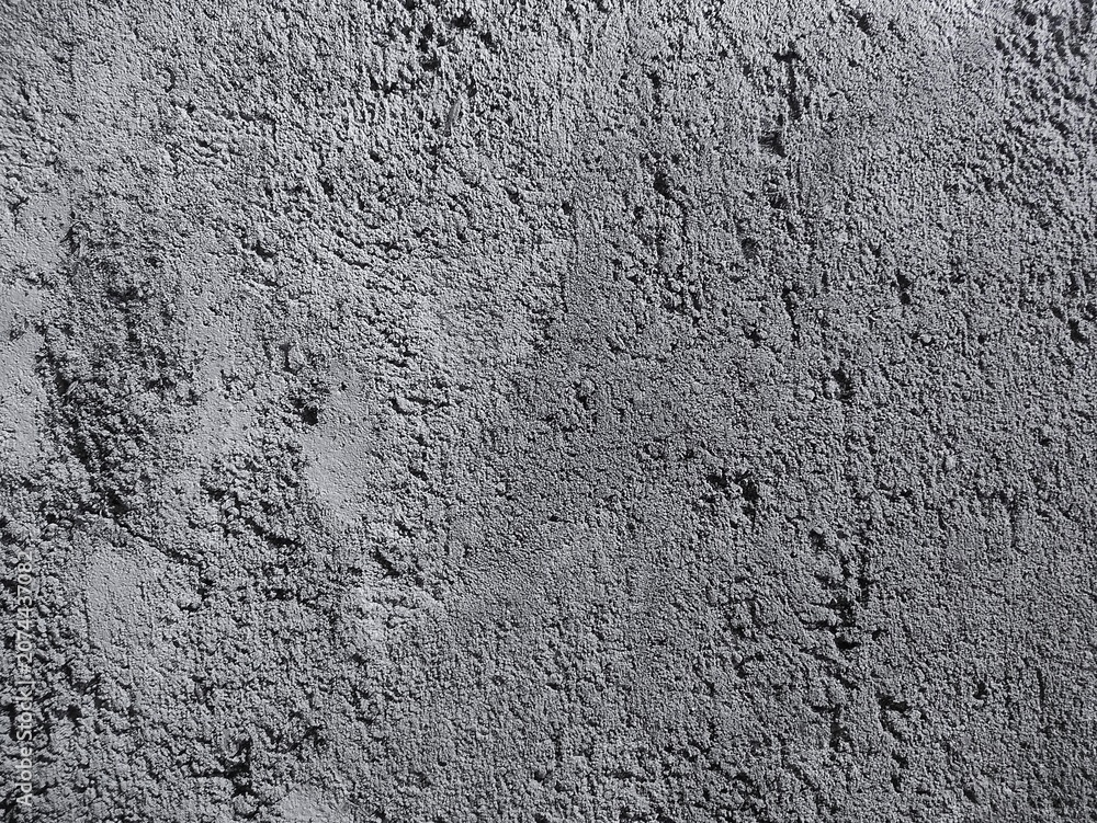 Obraz premium Minimalist monochrome grunge concrete wall texture with rough cement surface and industrial gray abstract background