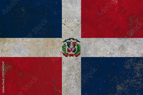 Dominican Republic flag painted on grunge concrete wall texture