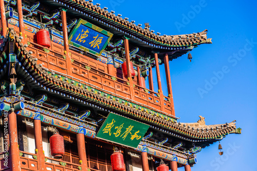 Datong, China - May 9 2026: The imposing façade of Datong Drum Tower showcases traditional Chinese architecture with elegant wooden construction, layered roofs, and enduring historical grandeur