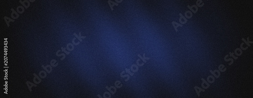 Soft dark blue background with subtle grainy texture and central light glow effect for modern elegant digital graphic design and artistic wallpaper background use.