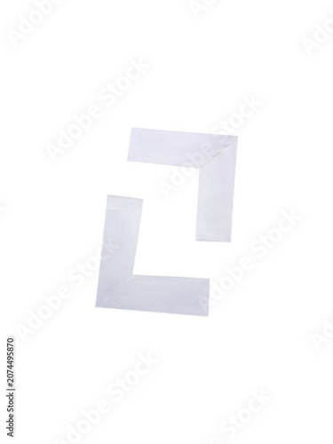 Letter l made of stacked white paper sheets on desk isolated on transparent background