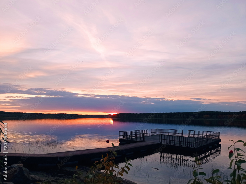 Fototapeta premium Horizontal Photo sunset lake view with pier