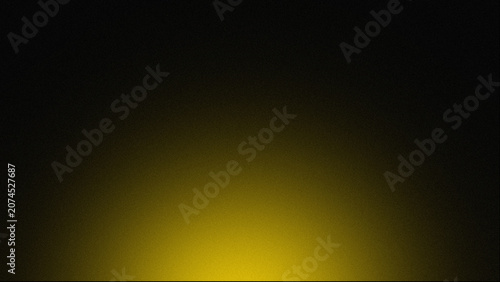 Dramatic yellow spotlight on black background, glowing golden light beam from bottom, atmospheric stage lighting effect for product presentation