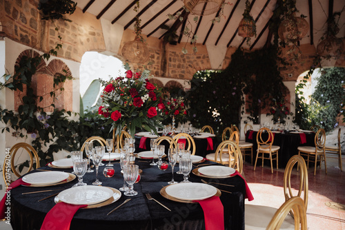 elegant table with a rose centerpiece