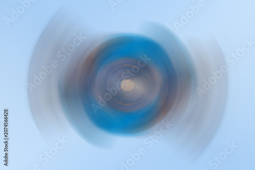 Abstract background of colored circles and blur motion. Background with radial, radiating, converging lines.