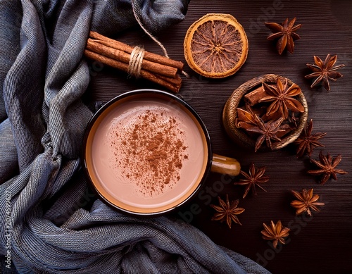 cozy hot chocolate flat lay with scarf and spices
