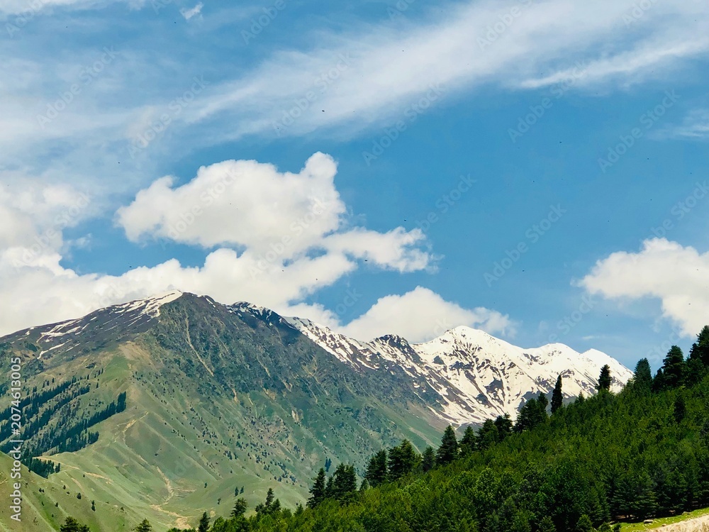 Fototapeta premium mountain landscape with blue sky and clouds