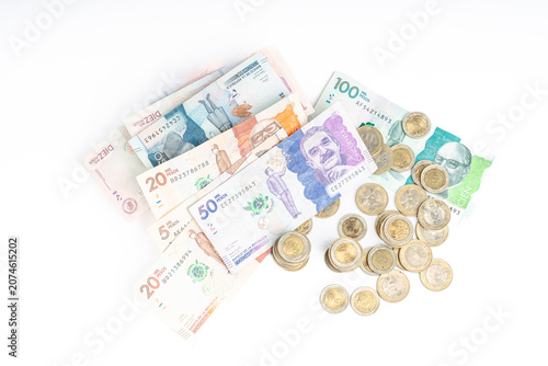 Colombian money on white background