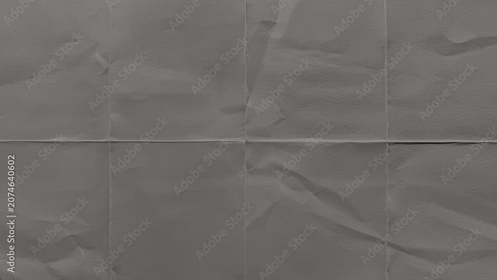 Fototapeta premium Gray textured paper background, crumpled style, perfect for desktop wallpaper.