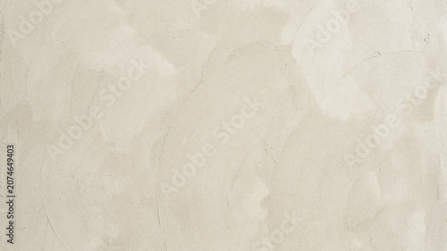 Minimalist beige plaster wall texture, neutral cream concrete surface background, elegant venetian stucco finish for interior design mockups