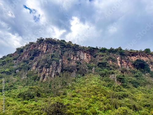 Storm clouds gather over the Great Rift Valley escarpment near Kariandusi, Kenya
