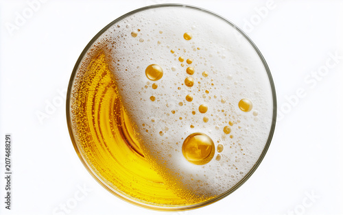 glass of beer isolated on white background, top view