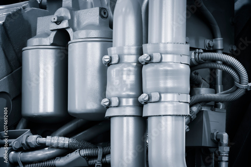 Foto Metallic pipes with flanges and bolts