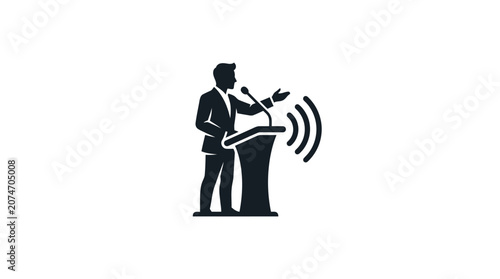 Obraz na plátně Man Speaking at a Podium Lectern.
