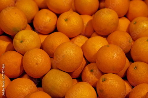 Obraz na plátne Vibrant Supermarket Citrus Section Background: Close-Up of Organic Fruits in Gro