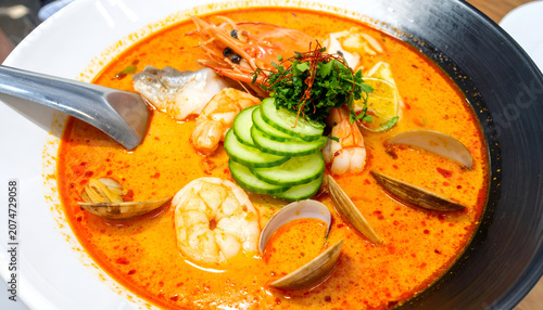 Spicy Thai Tom Yum Goong Soup with Shrimp and Clams.