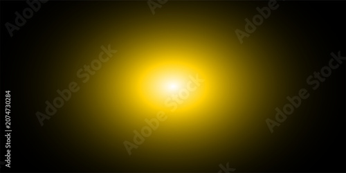 Abstract dark background featuring a bright luminous yellow lens flare effect and glowing circle light spot in the center on a solid black backdrop.