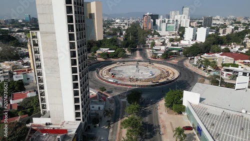 Guadalajara, Mexico - November 23 2025: Guadalajara, Mexico. Minerva Roundabout. Aerial view. Under renovation. Construction, barriers, equipment. Cityscape, streets, buildings, traffic, sunny
