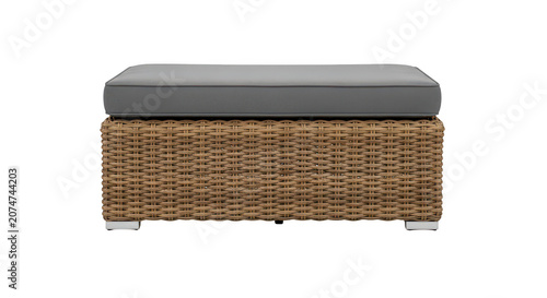 Woven wicker ottoman with padded grey fabric cushion.
