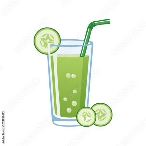 Green smoothie in glass with cucumber slices and straw