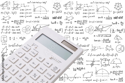 Obraz na płótnie White electronic calculator on white background with math and trigonometry formulas sketches