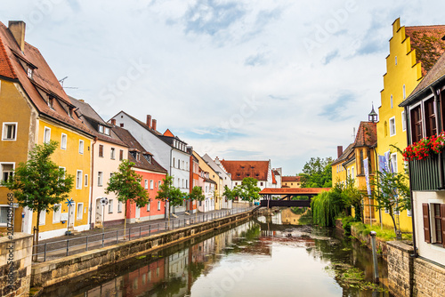 Colorful canal waterfront in the old town of Amberg Bavaria Germany