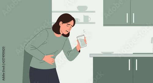 Woman Experiencing Abdominal Discomfort and Holding a Glass of Water in The Kitchen