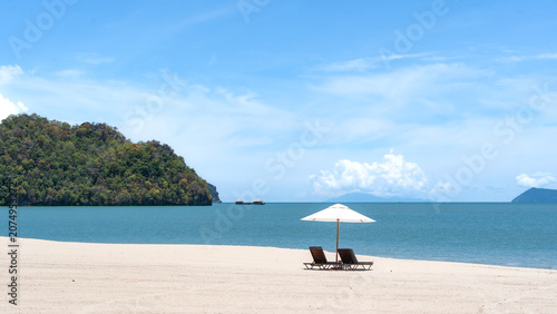 Quadro su tela White sand beach with single umbrella and sun loungers at Tanjung Rhu, Langkawi,