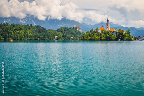Famous place with beautiful church on the green island, Slovenia